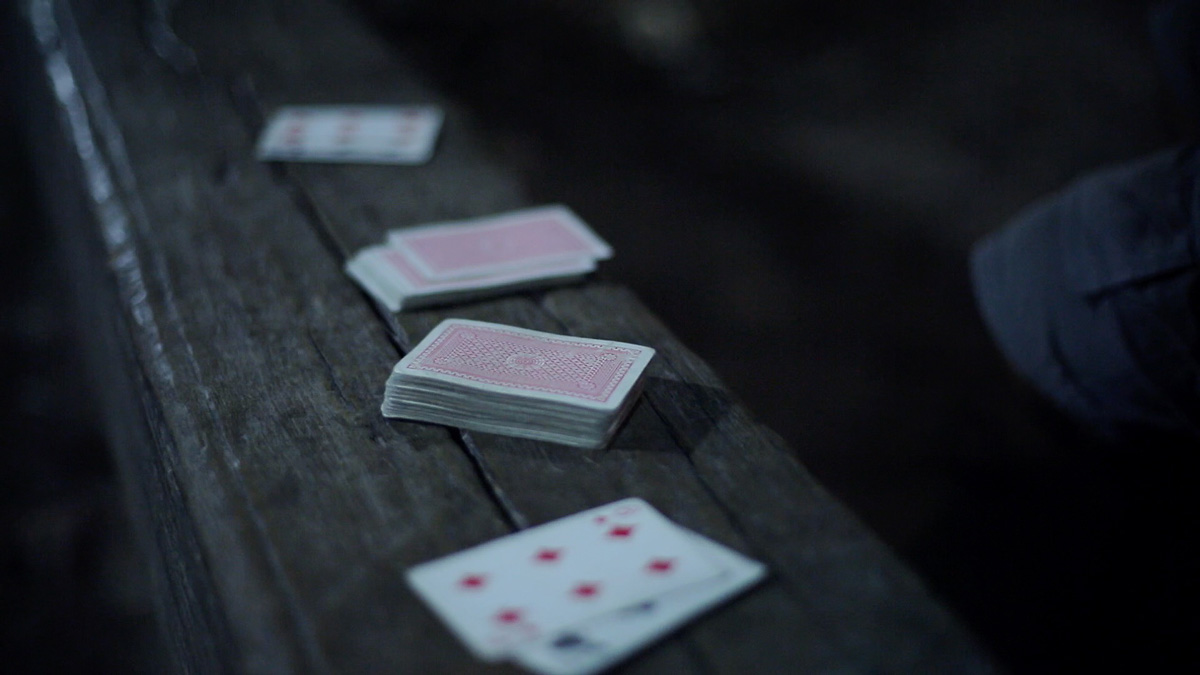 Playing Cards still from the film Objects in the mirror are as the appear by Tarje Eikanger Gullaksen